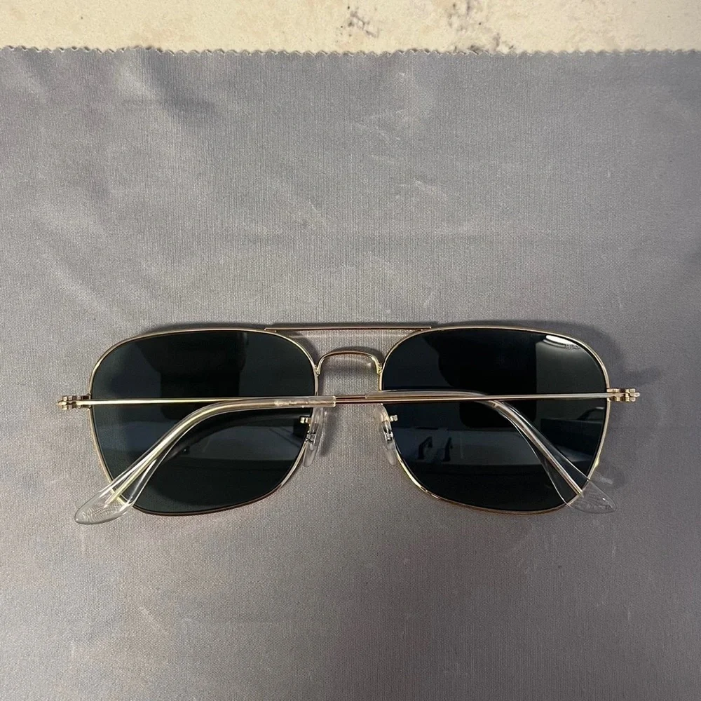 Ray-Ban Caravan Gold Frame Sunglasses with Green Lenses.